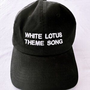 Intentionally Blank White Lotus Theme Song Slogan Hat SOLD OUT